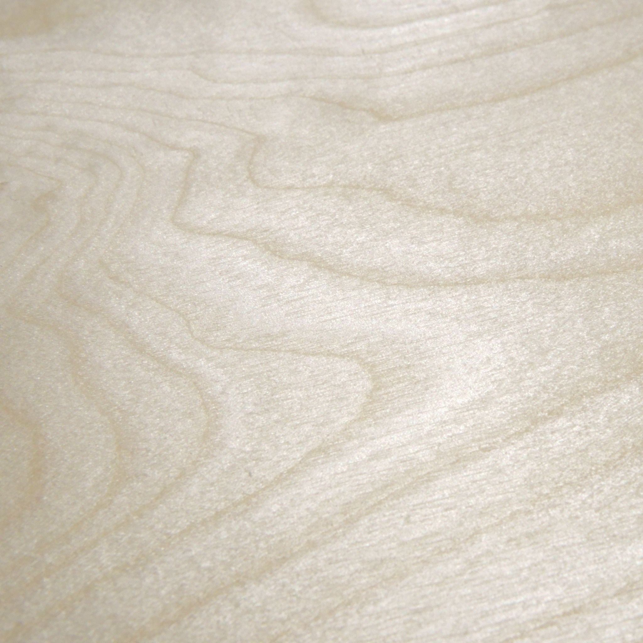 Birch
Birch has a white, satin like surface and due to its fine grain it holds detail extremely well. As one of the whitest natural woods we use it often as a contrast layer with respect to other wood species. Our Birch comes from Finland and meets all requirements for sustainable foresting.